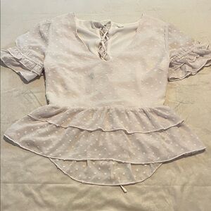 Elegant White Peplum Top with lace down back